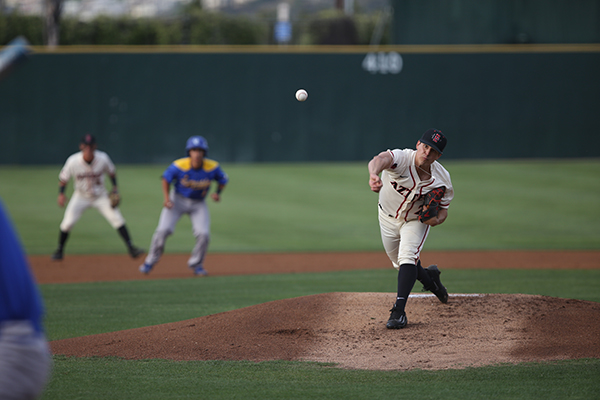 Junior right-hander Jorge Fernandez tosses a pitch against UCSB.