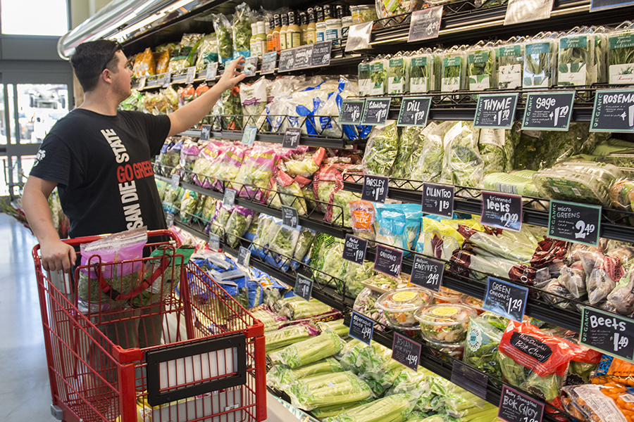 Economics senior Kevin Woods shops at the new Trader Joes in South Campus Plaza.