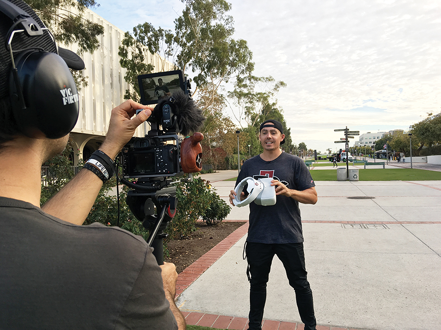 Alex Kavanagh, founder of DRONEGEAR, appears on camera for a video for his YouTube channel.