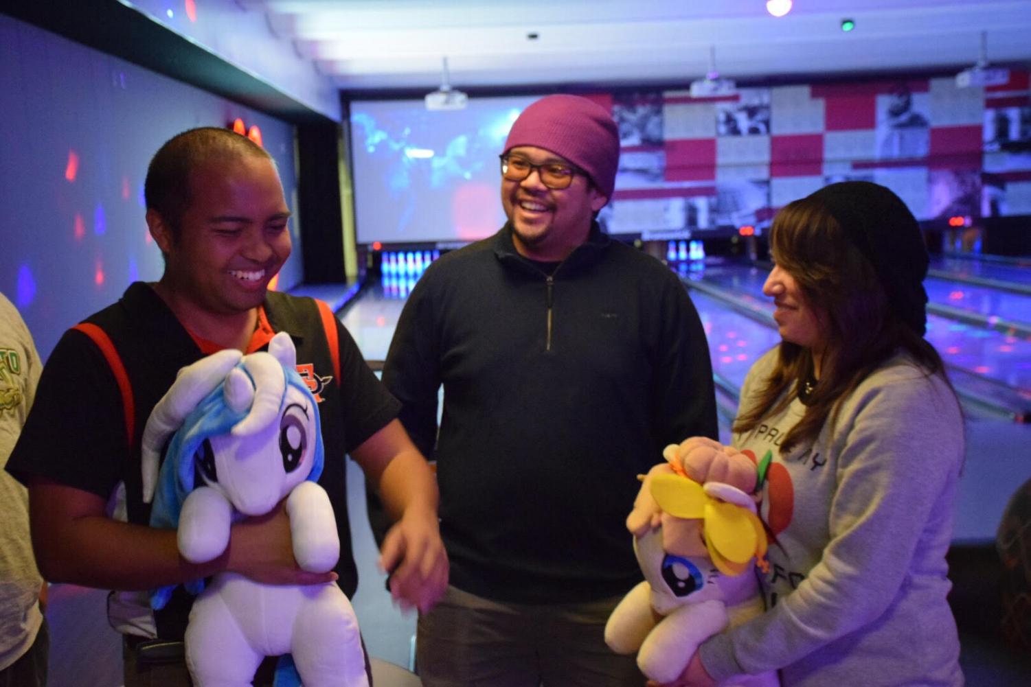 Bronies Nolan Alisasis and Ohmeko Ocampo, along with pegasister Samantha Ramos, take a break from bowling to discuss the