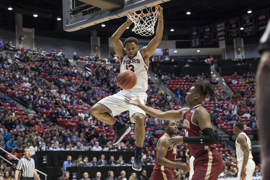 Desean Murray finishes off a dunk during Auburns 62-58 victory over Charleston on March 16 at Viejas Arena.  