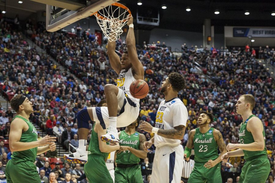 Junior forward Sagaba Konate dunks the ball during the Mountaineers 94-71 victory over Marshall on March 18 at Viejas Arena.
