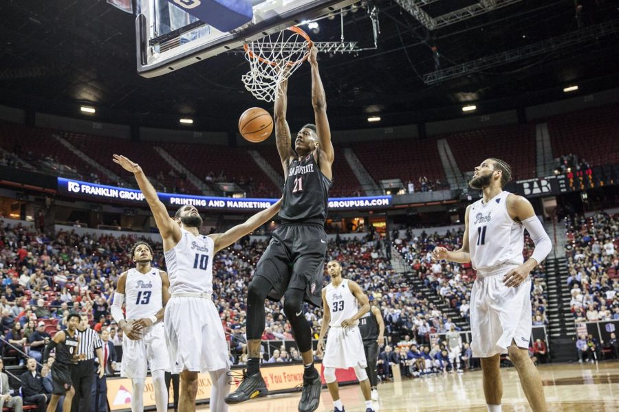 Malik Pope dunks the ball during the Aztecs 90-73 victory over Nevada on March 9 at the Thomas & Mack Center. 