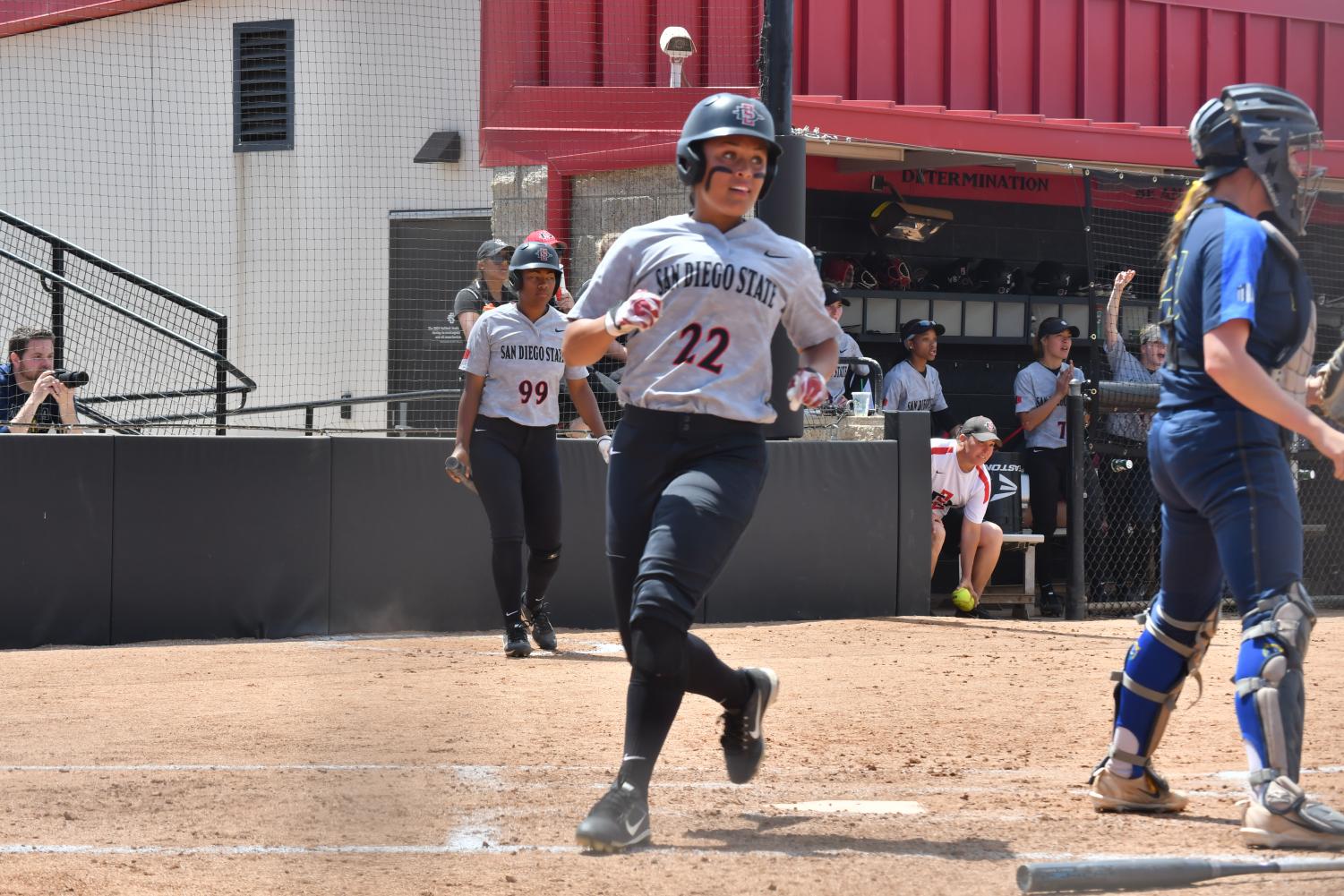 Sophomore outfielder Kiera Wright comes around to score during the Aztecs 6-3 loss to Nevada at SDSU Softball Stadium on April 15.