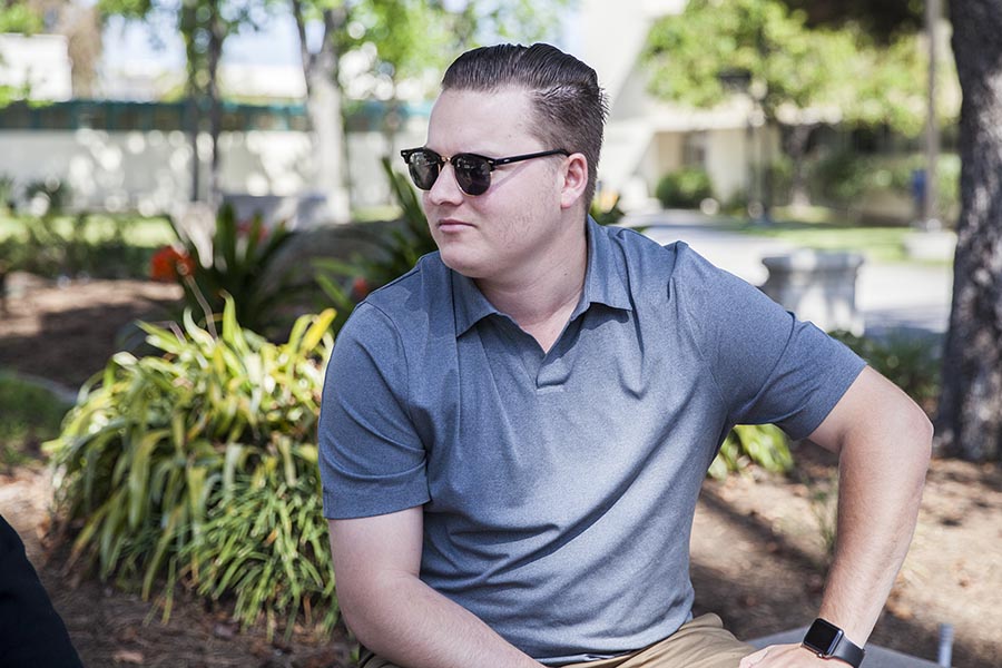 Brandon Jones, now-former president of SDSU College Republicans, near the Education and Business Administration building on April 23.