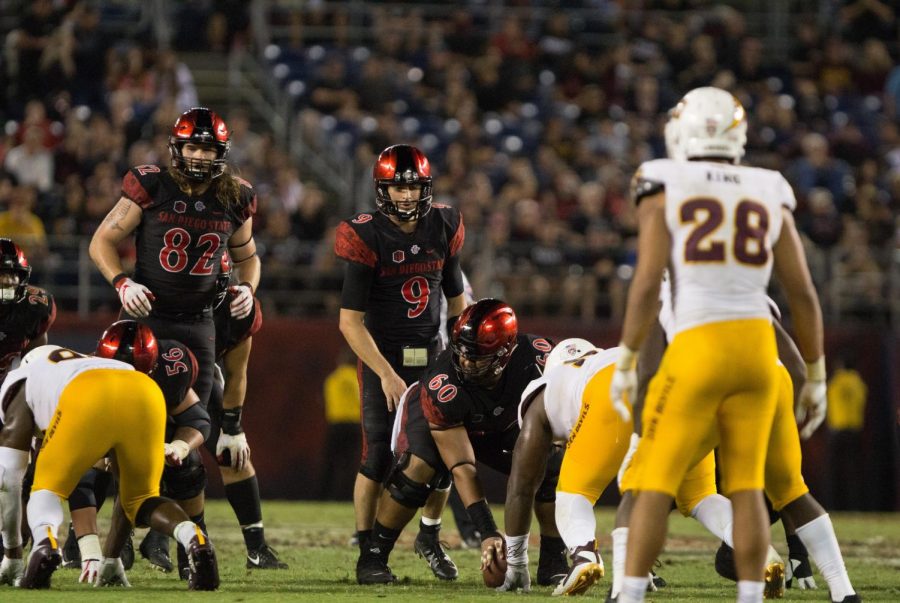 Redshirt junior quarterback Ryan Agnew prepares to take a snap from under center during the Aztecs 28-21 victory over Arizona State on Sept. 15 at SDCCU Stadium.