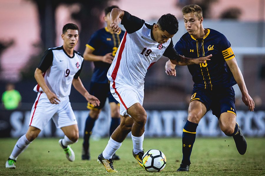 Damian German fights for the ball during the Aztecs 2-0 loss to UC Berkeley on Nov. 4, 2018 at the SDSU Sports Deck.