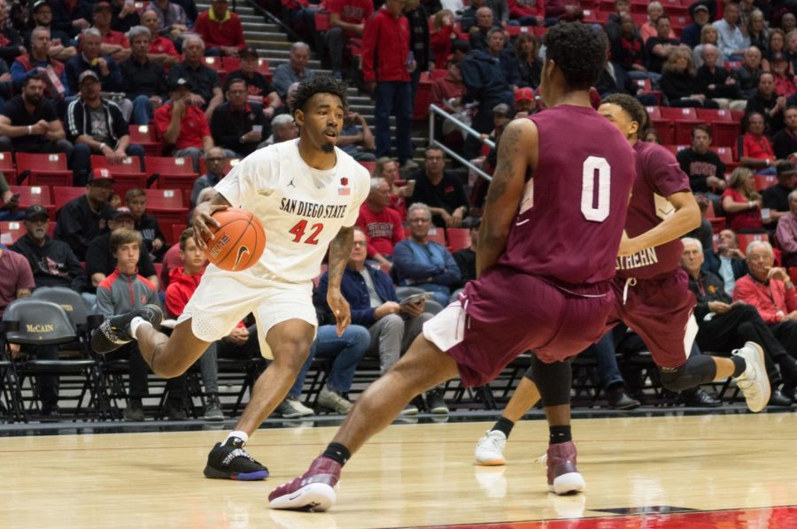 Jeremy Hemsley controls the ball during the Aztecs 103-64 victory over Texas Southern on Nov. 14 at Viejas Arena. 