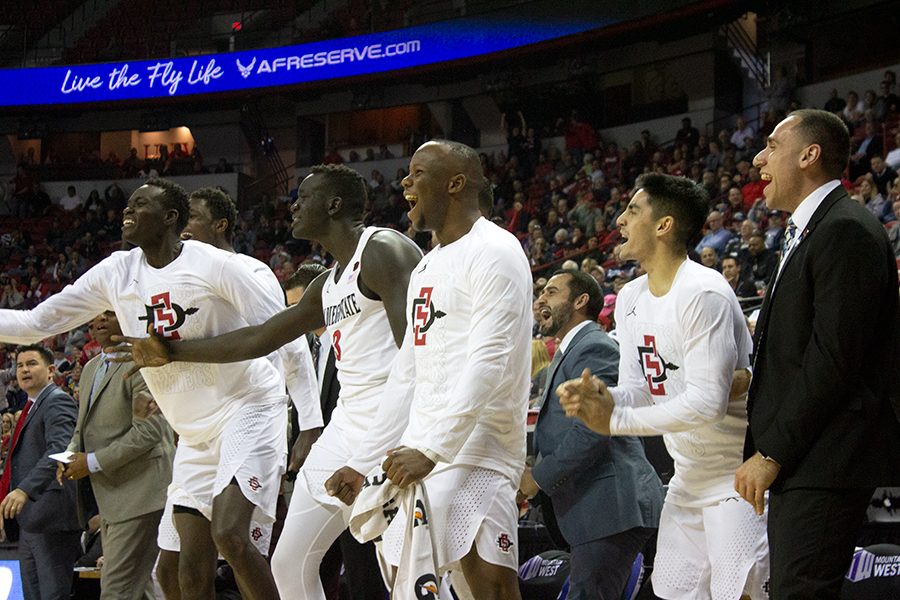 San Diego States bench cheers after a three-pointer by the Aztecs during their game against UNLV on March 14. 