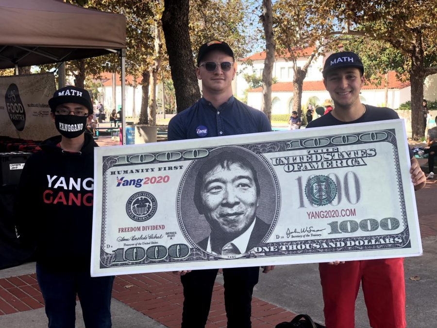 Student organizers canvass outside Love Library for Andrew Yang (D). 