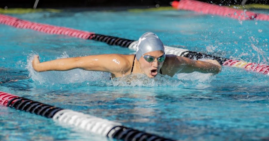 A San Diego State swimmer competes in the breaststroke in the Aztecs’ first home meet of the season against Pepperdine and Boise State on Oct. 18, 2019 at the Aztec Aquaplex.