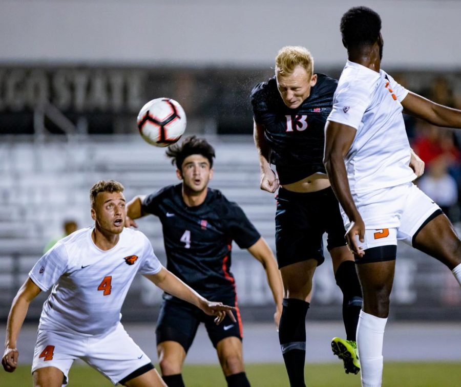 Senior defender Miles Stray heads the ball during the Aztecs 1-0 loss to Oregon State on Oct. 24 at the SDSU Sports Deck.