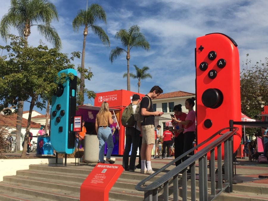Students lined up to play Nintendo games during the promotion of the Nintendo Switch Lite.