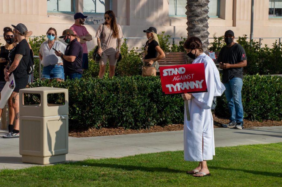 A San Diego county resident dressed as Princess Leia from Star Wars is against strict reopening guidelines. 