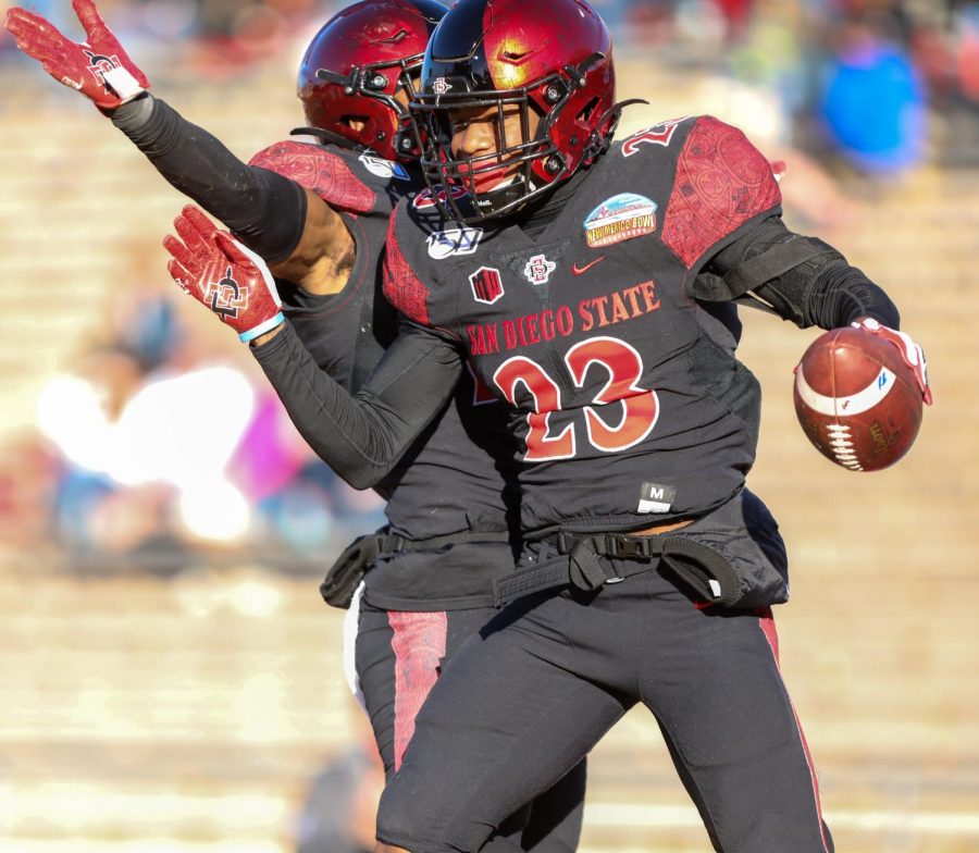 Then-sophomore cornerback Darren Hall celebrates after returning a fumble for a touchdown  during the Aztecs’ 48-11 win over Central Michigan on Dec. 21, 2019 at the New Mexico Bowl in Albuquerque, New Mexico.