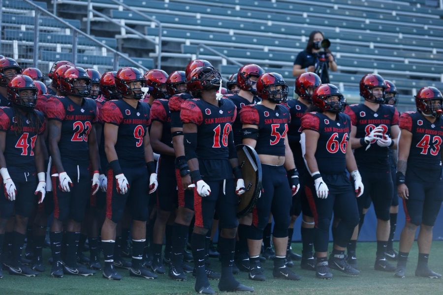 The SDSU football team looks to take the field before the Aztecs’ 34-10 win over Hawaii on Nov. 14 at Dignity Health Sports Park in Carson, Calif.