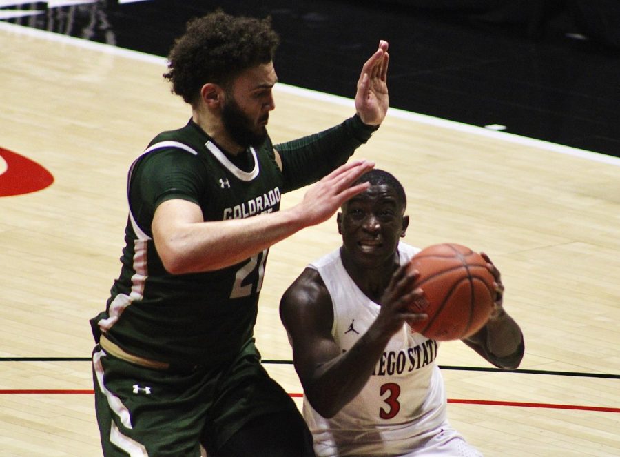 Senior guard Terrell Gomez looks to attempt a shot against Colorado State sophomore forward David Roddy during the Aztecs 70-67 loss to the Rams on Jan. 2 at Viejas Arena.