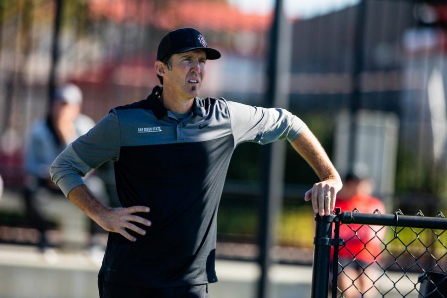 San Diego State men’s tennis head coach Gene Carswell looks on during a match at the SDSU Tennis Center.