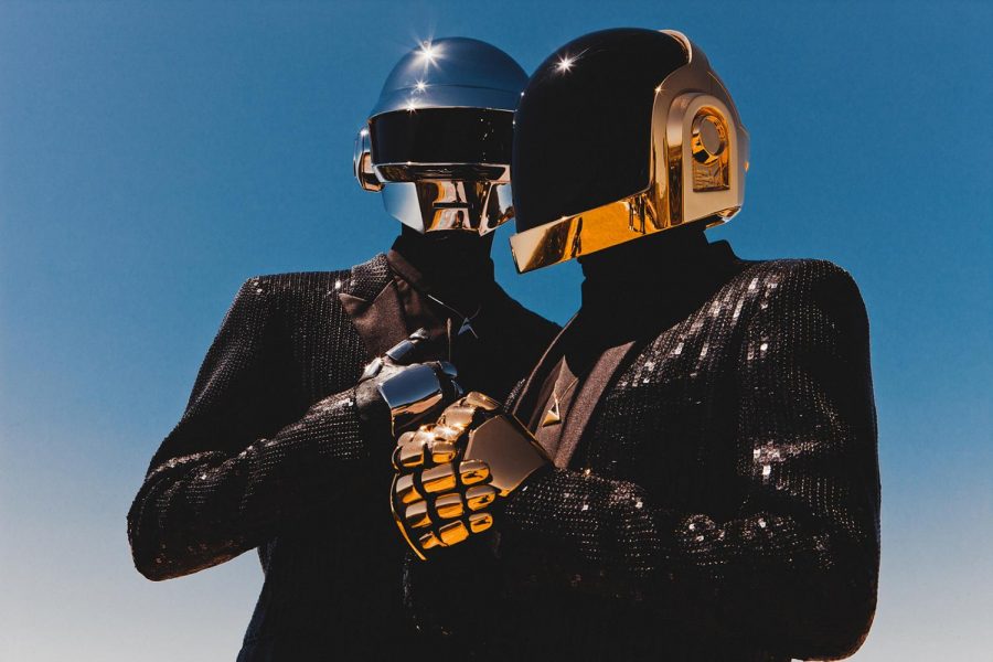 French+electronic+music+duo+Daft+Punk+revolutionized+dance+music+by+incorporating+futuristic+audio+and+visual+sounds+in+their+work.