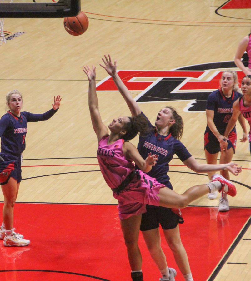 San Diego State women’s basketball senior guard Téa Adams drives for a layup during the Aztecs 79-77 win over Fresno State on Feb. 20, 2021 at Viejas Arena.