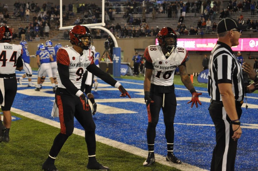 Senior defensive back Tayler Hawkins (9) and senior safety Trenton Thompson (18) having a discussion with the referee against Air Force.