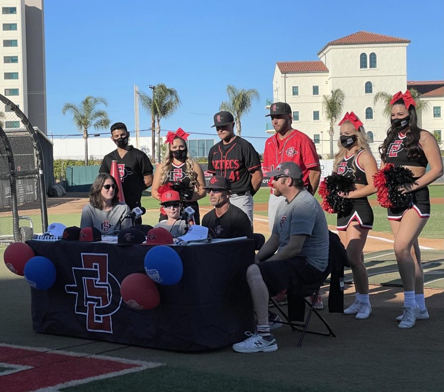 Ten-year-old Nathaniel Wolpoff's signing day took place at Tony Gwynn Stadium with his family, manager Mark Martinez, SDSU baseball players, SDSU cheer, and others in attendance. 