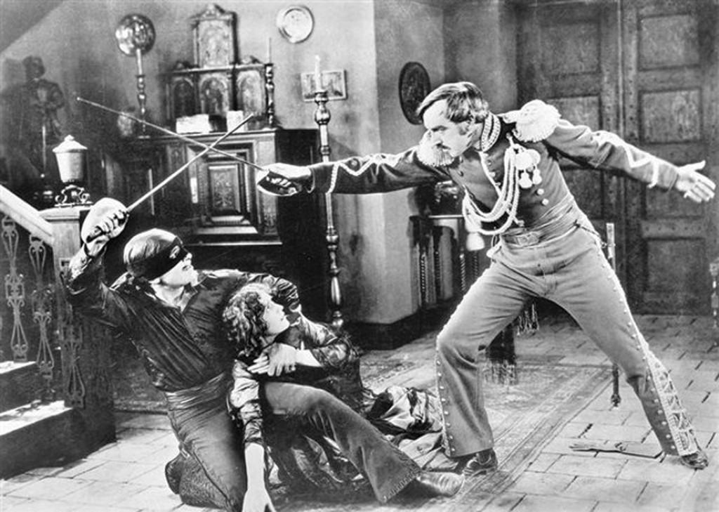 Actors do battle in a still from the film “The Mask of Zorro.” | courtesy of Moma Film archive