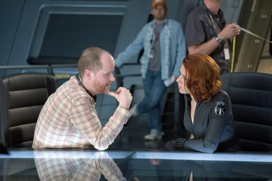 Director Joss Whedon talks with Black-Widow (Scarlett Johansson) about her role on the set of “The Avengers.” / Courtesy of Zade Rosenthal