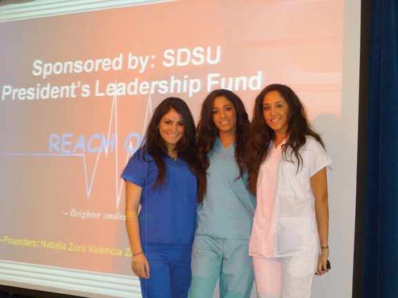 (From left to right) Health and Dental Outreach program members Claudia Hammi, Valencia Zora and Natalia Zora. | Courtesy of Claudia Hammi