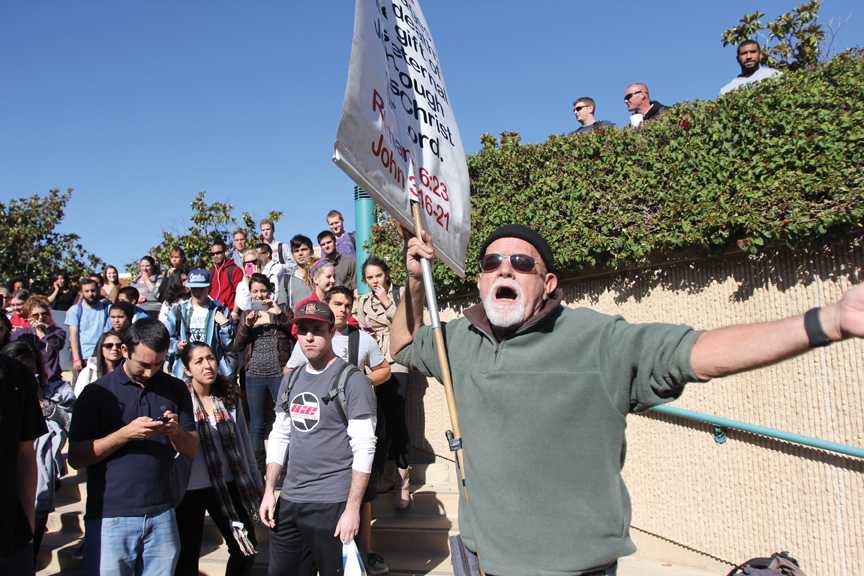 San Diego’s college campus preacher stirs students into heated arguments on a regular basis, but yesterday’s demonstration made an unexpected turn, Antonio Zaragoza/ photo editor