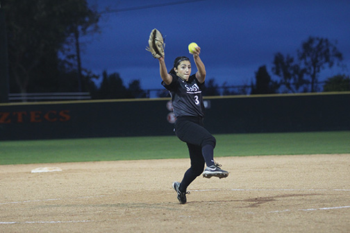 OToole pitches the softball.