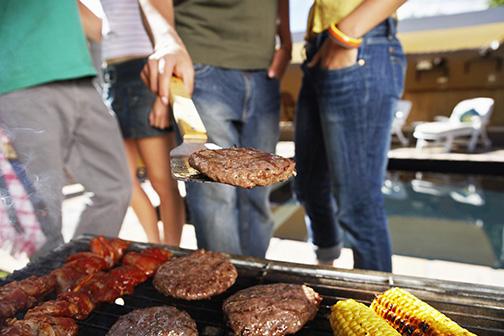 People Grilling Outdoors