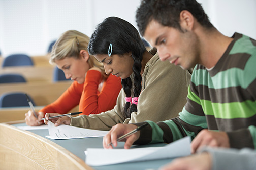 Three Students Taking a Test