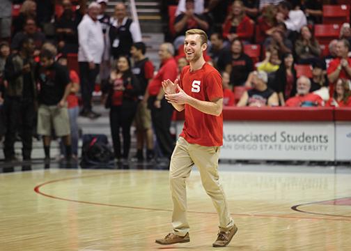 Student sinks lucky half-court shot