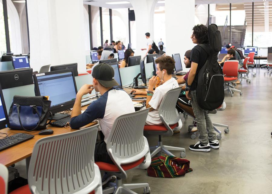 Students taking advantage of the new perks the remodeled Library Computing Hub has to offer.