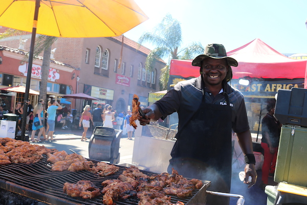Flavors of East Africa serves their signature meals to festival goers.