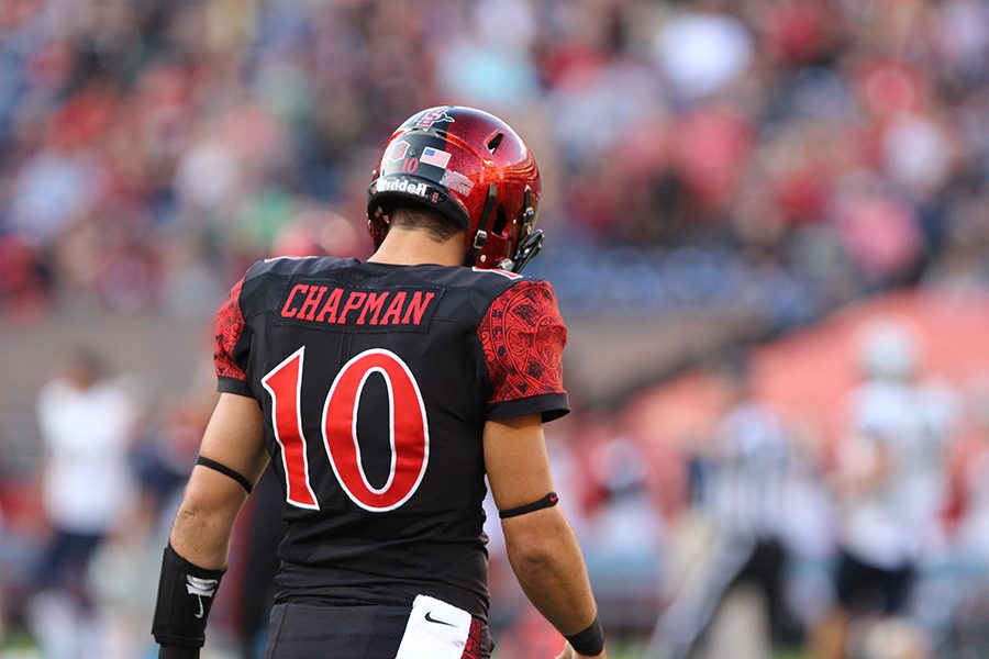 Redshirt sophomore quarterback Christian Chapman walks off the field after a failed play.