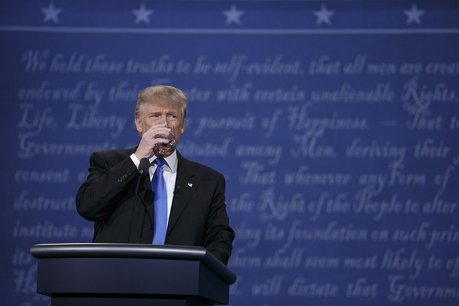 Trump takes a drink during the first 2016 presidential debate.
