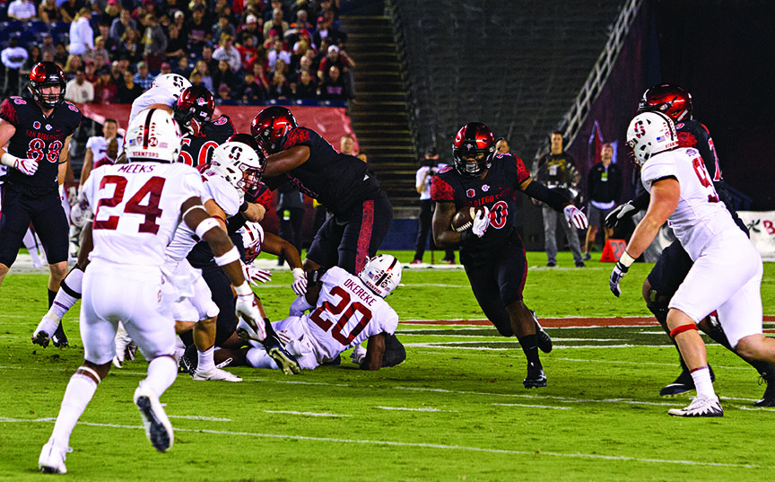 Senior running back Rashaad Penny finds a hole in the Stanford defense during SDSUs 20-17 win over the Cardinal on Sept. 16.