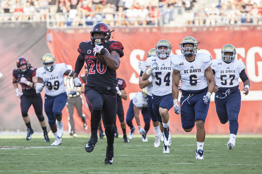 Senior running back Rashaad Penny outruns the entire UC Davis defense on his way to a touchdown.