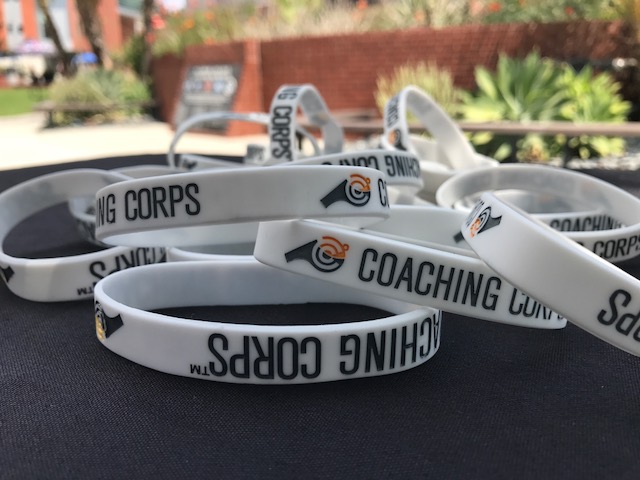 Coaching+Corps+members+table+at+the+University+of+California+Berkeley+for+a+team+captain+retreat+last+year.