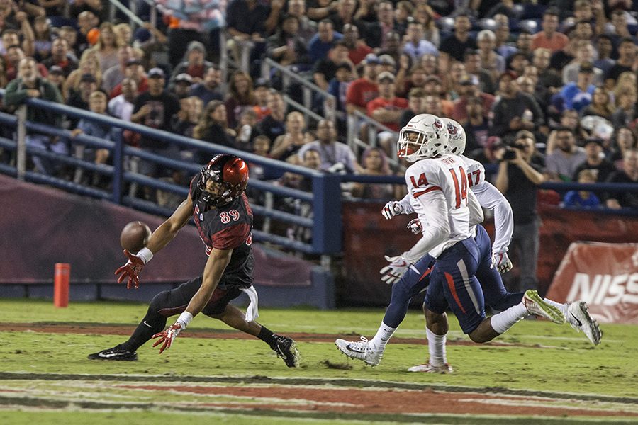 Junior wide receiver Fred Trevillion attempts to make a catch during the first quarter of SDSUs 27-3 loss to Fresno State.
