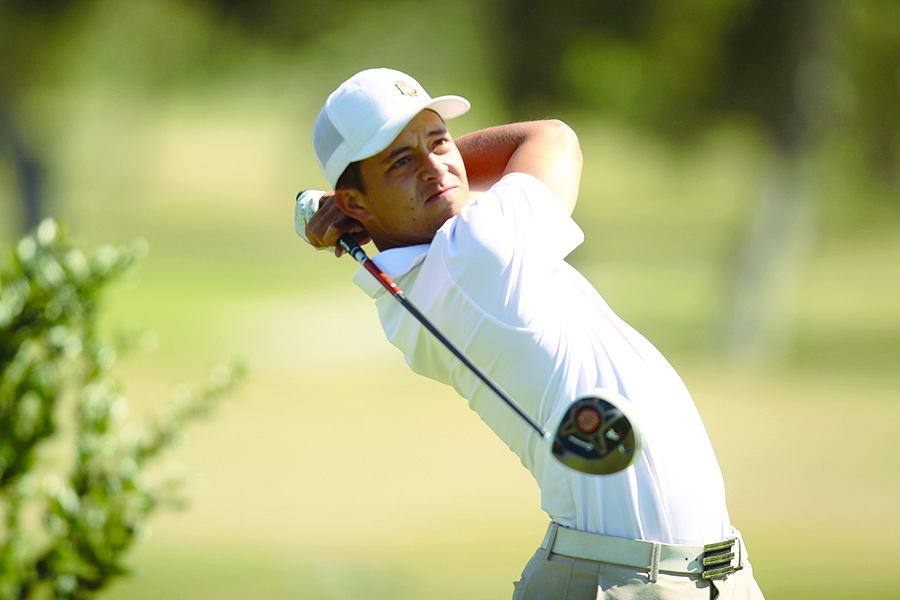 SDSU alumnus Xander Schauffele looks on after a drive during the 2013 season.