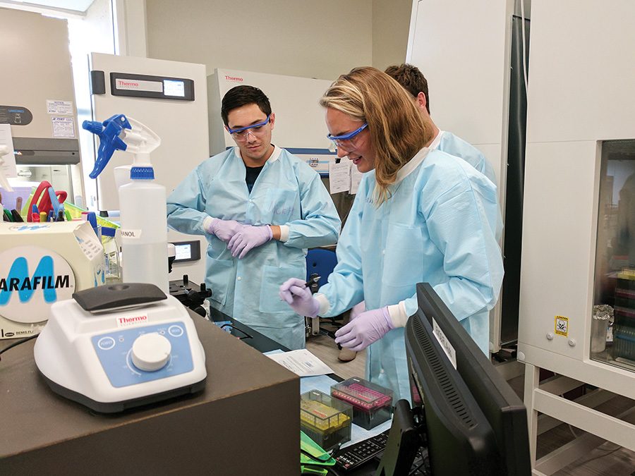 Bridges to Stem Cells interns train in a laboratory, August 2017. Photo courtesy of Susan Kaiser.