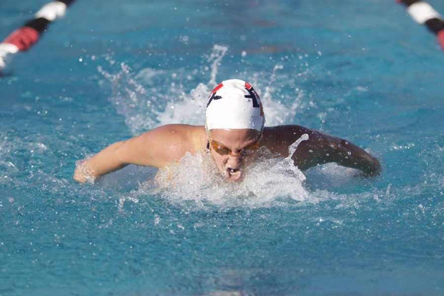 An SDSU swimmer competes in the 200-meter butterfly during the Aztecs dual-meet victory over Pepperdine and UC San Diego on Dec. 1.