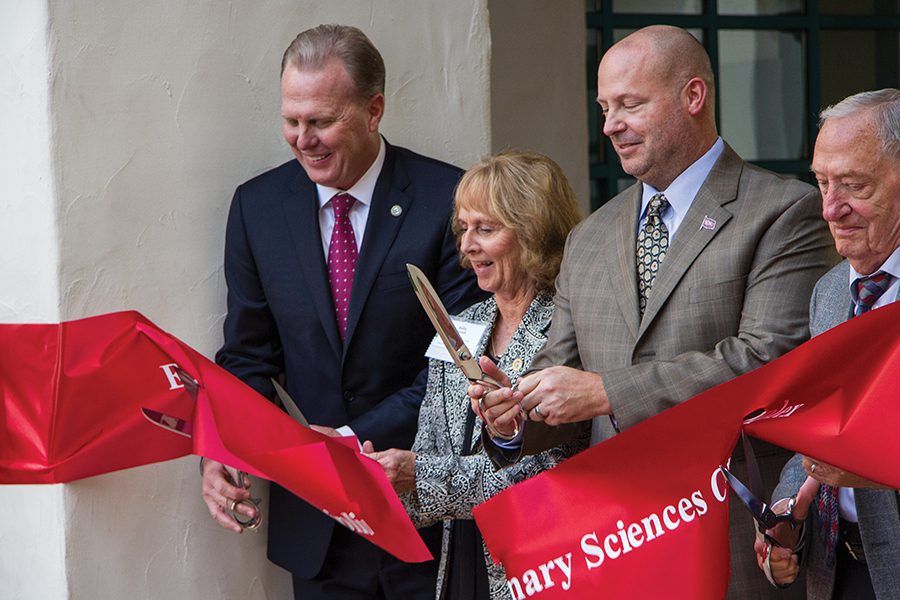 San Diego Mayor Kevin Falconer, San Diego State President Sally Roush and Vice Chair of the CSU Board of Trustees Adam Day celebrate the opening of the new Engineering and Interdisciplinary Sciences Complex.