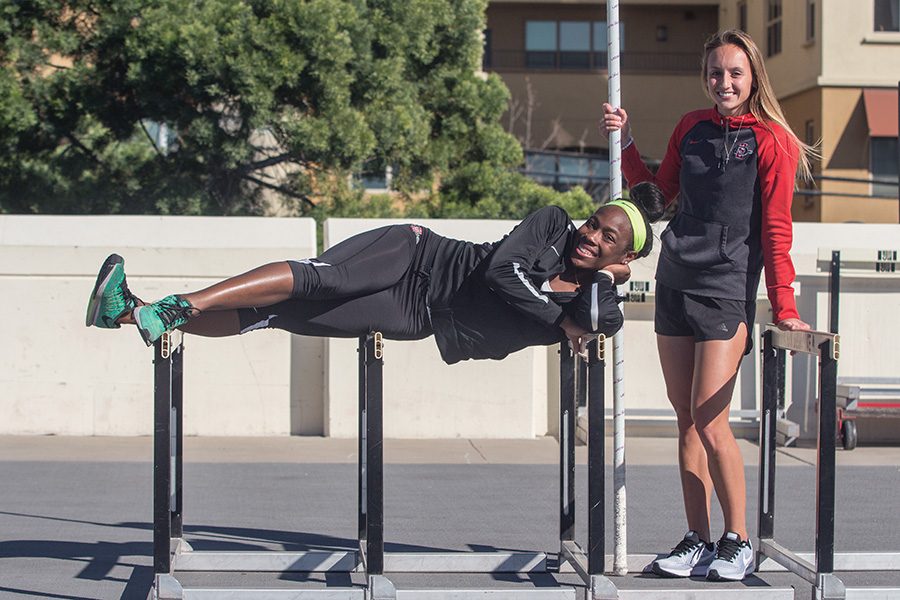 Senior Ashley Henderson (left) and redshirt junior Bonnie Draxler pose after practice on Feb. 16 at the Aztecs Sports Deck. 