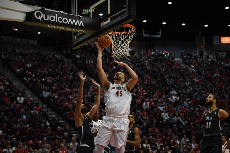 Senior+center+Kameron+Rooks+goes+up+for+a+layup+during+the+Aztecs+79-74+victory+over+No.+21+Nevada+on+March+3+at+Viejas+Arena