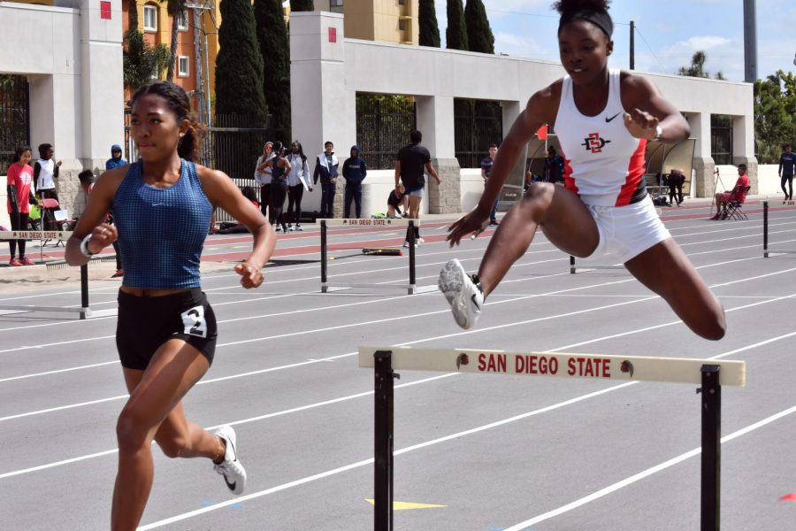 Jasmine Young competes during the 400-meter hurdles during the Aztec Invitational at the Aztrack Sports Deck on March 24. 