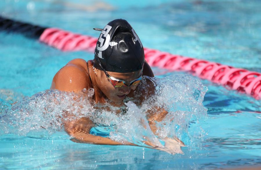 Sophomore swimmer Larisa Tam competes in the 100-yard IM event during the Aztecs first meet of the season against University of San Diego on Sept. 14 at the Aztec Aquaplex. 
